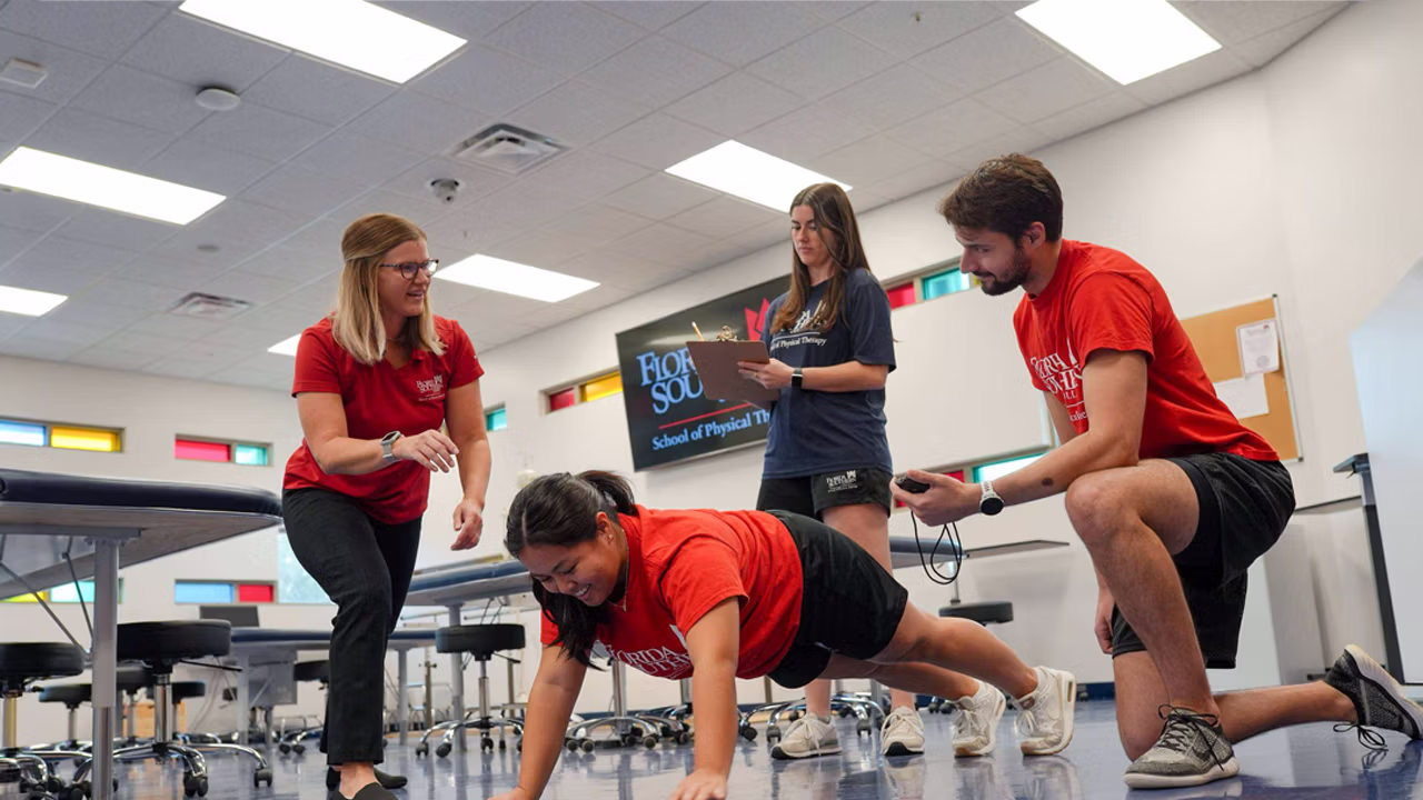 Students working in a lab within the Academic Center for Physical Therapy