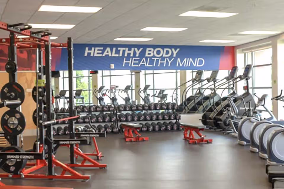 Students using treadmills and elliptical in the Kirk McKay, Jr. Exercise Room