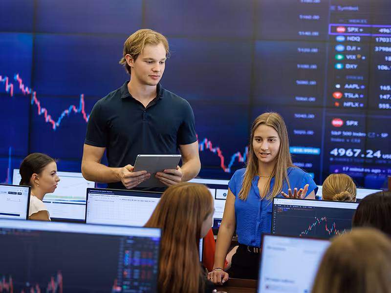 Students leading business meeting