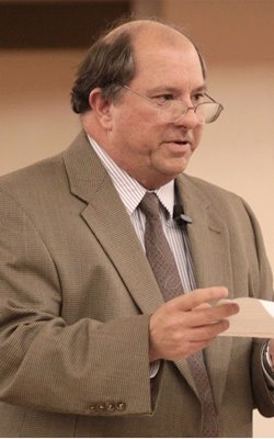 Dr. James M. Denham speaking