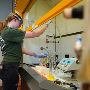 Jenna McHardy working with lab equipment