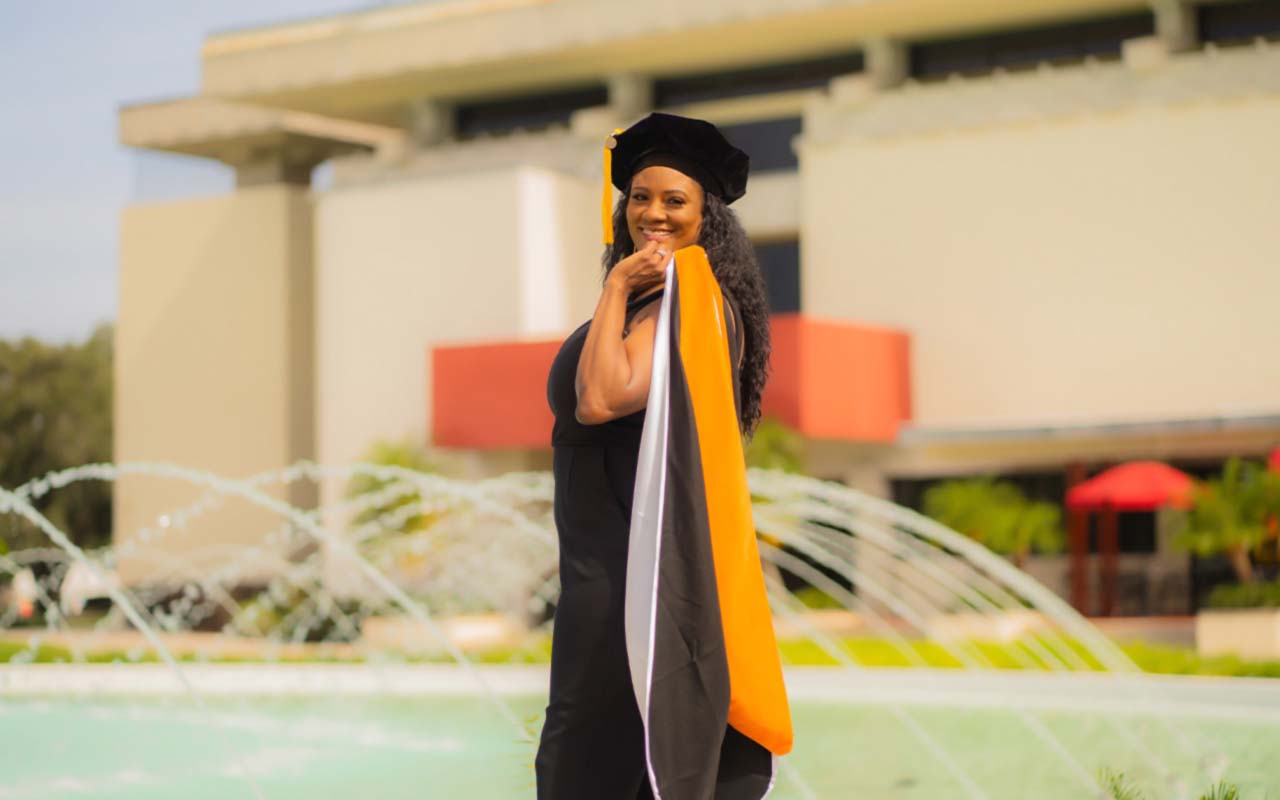 Dorothea Thompson in graduation attire