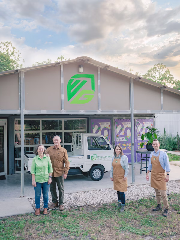 the Baltich family in front of their farm