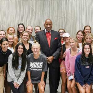 George Tinsley with FSC's Women's Lacrosse Team
