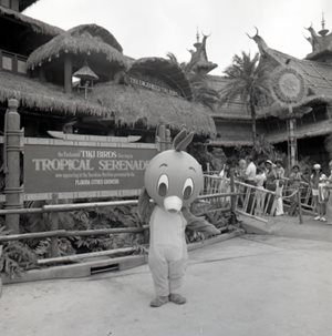 The Orange Bird mascot standing outside the Tropical Serenade in Disney World