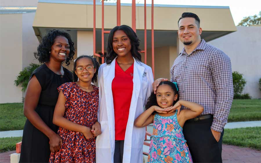 family at white coat